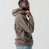 Seitenansicht eines männlichen Models im grauen Boxer Hoodie.