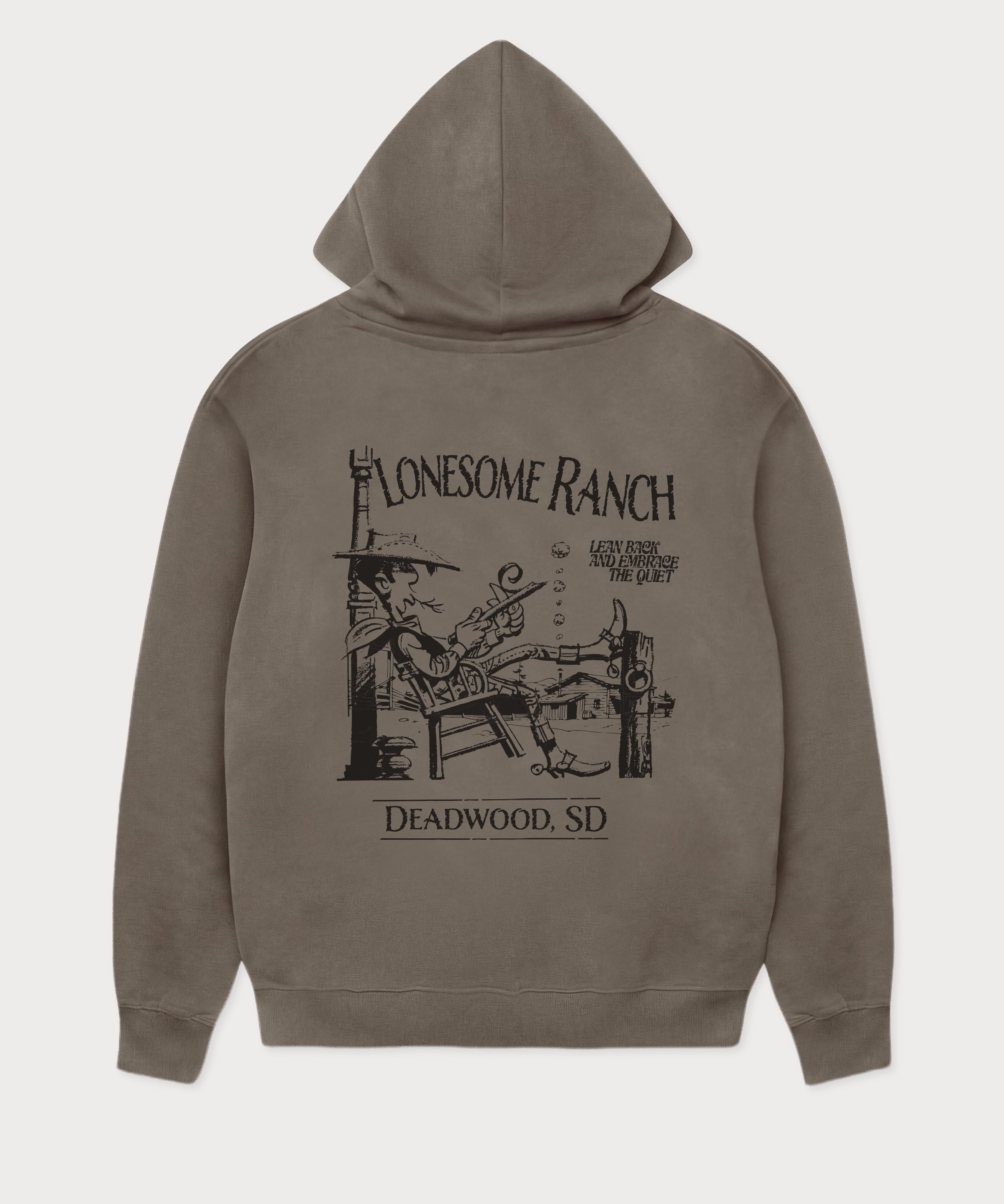 Rückansicht des grauen Boxer Hoodies mit großem Lucky Luke Lonesome Ranch-Print. Lucky Luke, der sich entspannt auf der Ranch in Deadwood zurücklehnt.