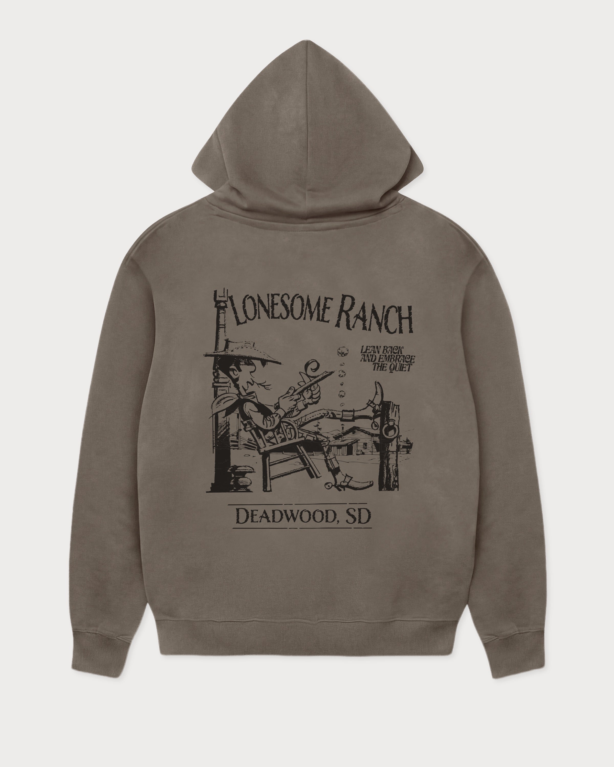 Rückansicht des grauen Boxer Hoodies mit großem Lucky Luke Lonesome Ranch-Print. Lucky Luke, der sich entspannt auf der Ranch in Deadwood zurücklehnt.